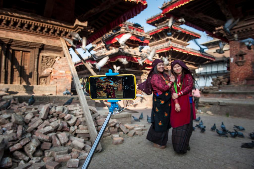 Women using a selfie stick