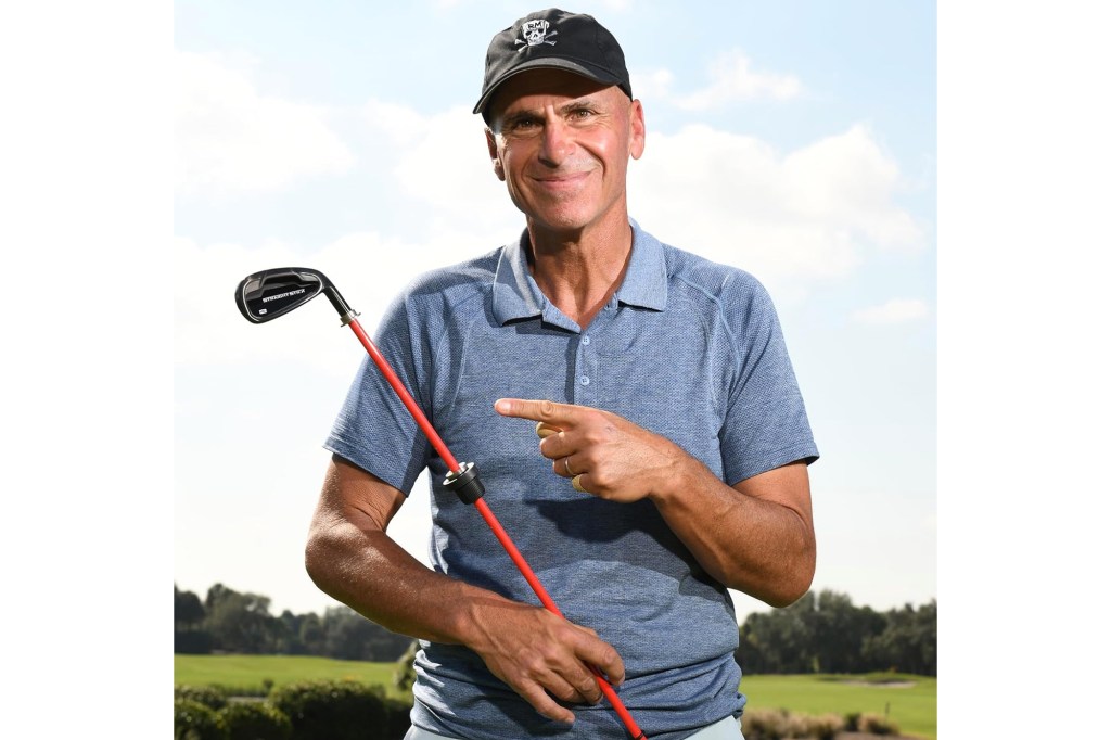 Man holding golf club