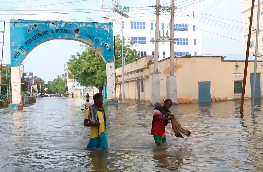 Residents were seen moving through floodwaters on a street in the town of Beledweyne, in Somalia on, Nov. 19, 2023.