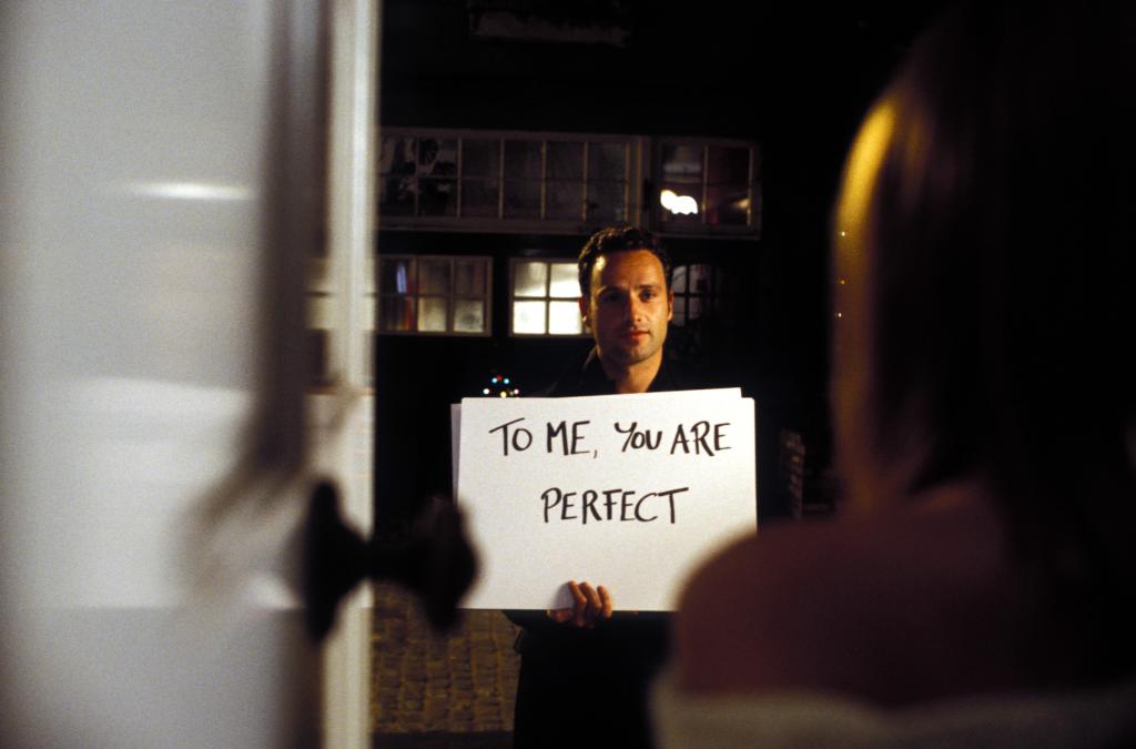 The iconic scene, which comes during the film's climax, features the character Mark (played by Andrew Lincoln) arriving at the home of his best friend Peter (Chiwetel Ejiofor) to silently declare his love for Peter's wife, Juliet (Keira Knightley) using a boombox and handwritten notecards. 