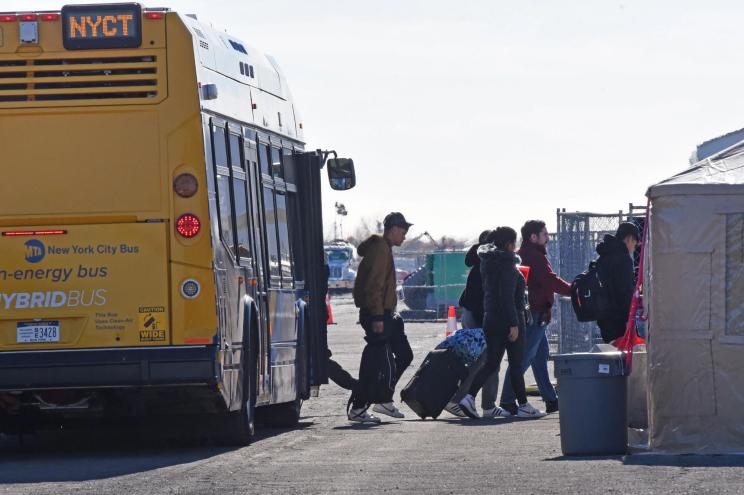 Migrants arriving at Floyd Bennett Field in Brooklyn on Nov. 20, 2023.