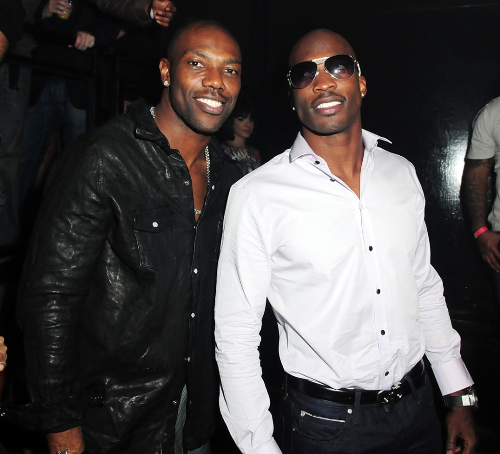 Terrell Owens and Chad Ochocinco attend Chad Ochocinco's birthday party at Mansion nightclub on January 20, 2011 in Miami Beach, Florida. 