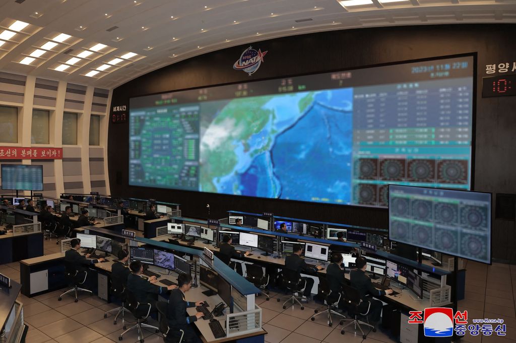 Large screens are on display at North Korea's Pyongyang General Control Center a day after the nation launched a rocket carrying a "spy" satellite. 