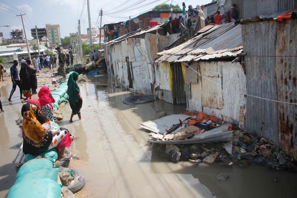 Somalis stranded in a slum area after heavy rains hit with floods in Mogadishu Somali, Tuesday, Nov. 21, 2023.