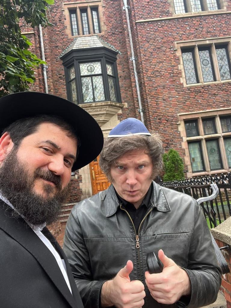 Argentina's new president Javier Milei posing with Chabad Rabbi Mendy Kotlarsky.