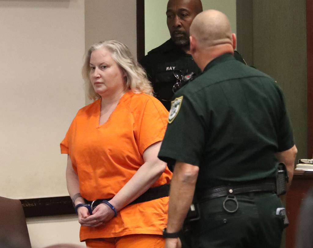 Tammy Sytch is escorted to the defence table by Volusia Couty Sheriff's bailiffs, Monday November 27, 2023 during her sentencing.