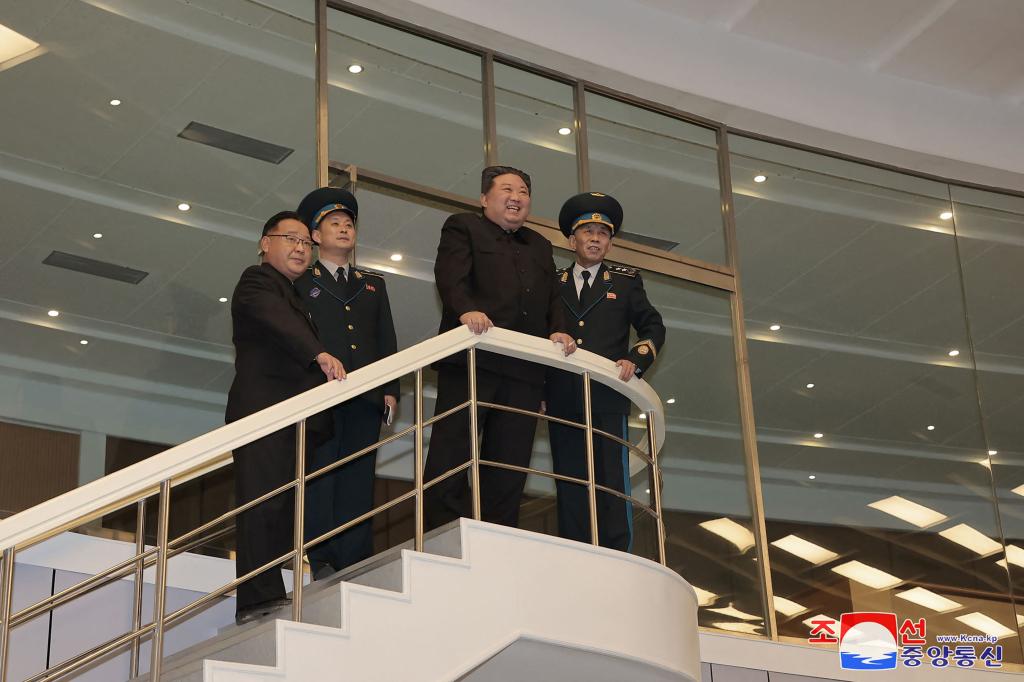 Kim Jong Un visits the Pyongyang General Control Center of the Korean National Aerospace Technology Directorate, a day after launching a reconnaissance satellite.