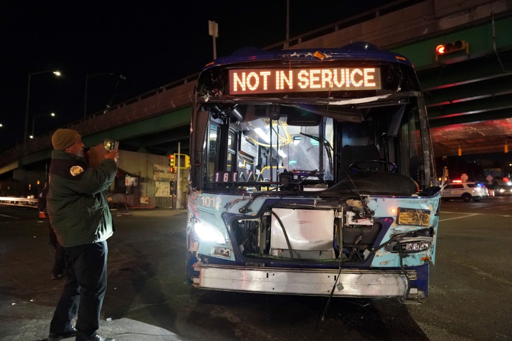 The scene where the MTA bus and a NYC Sanitation garbage truck collided is shown on Bruckner Boulevard at Hunts Point Avenue in the Bronx on Dec. 20, 2023. 