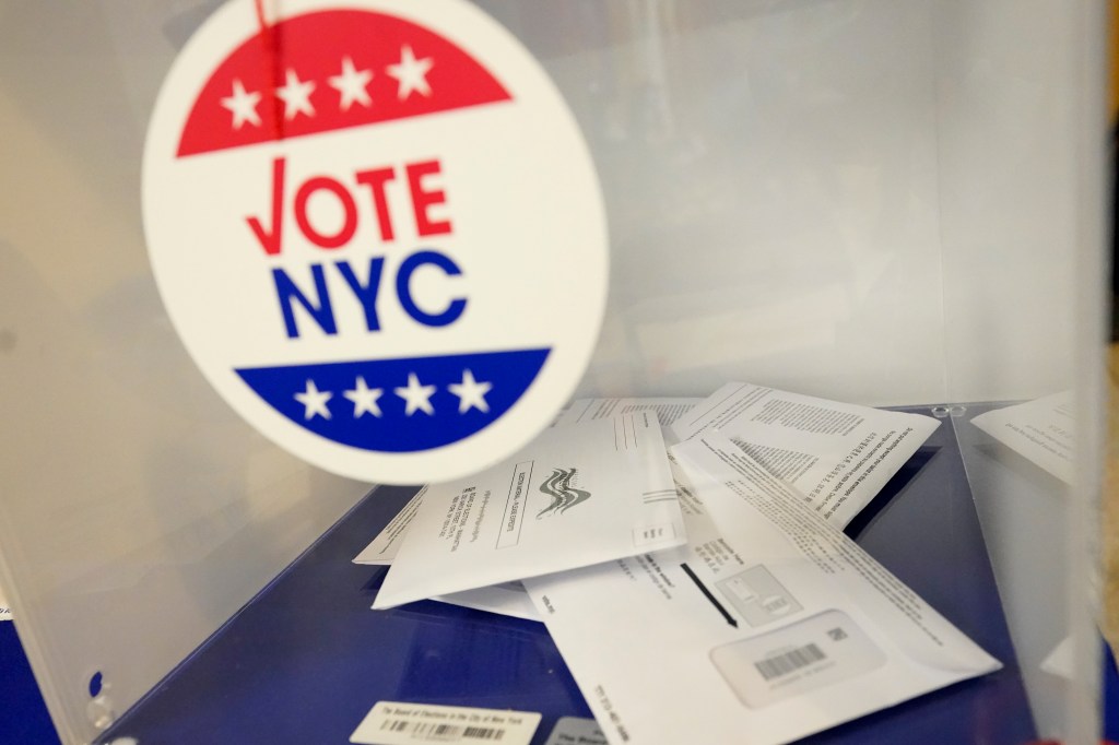 Absentee ballots sit in a ballot box during early voting in the primary election, Monday, June 14, 2021, at the Church of St. Anthony of Padua in the Soho neighborhood of New York