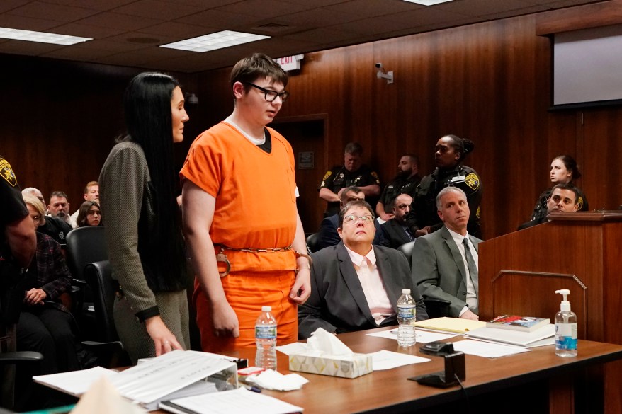 Ethan Crumbly stands and addresses the court before his sentencing on Friday, Dec. 8, 2023, in Pontiac, Mich. Crumbly was sentenced to life in prison for killing four students, wounding more and terrorizing Michigan's Oxford High School in 2021. 