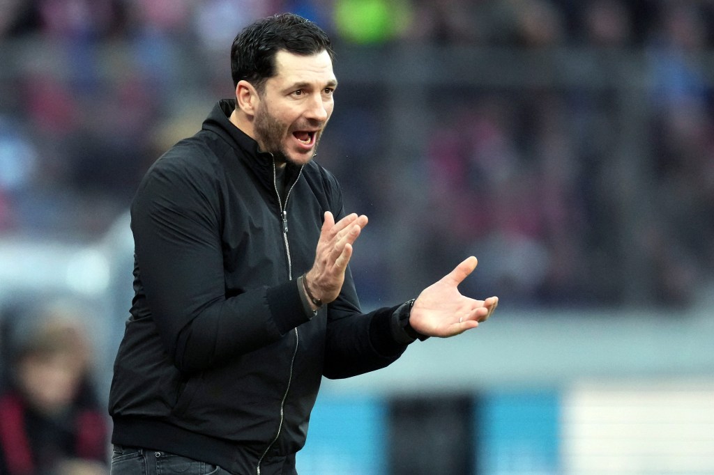 Berlin's head coach Sandro Schwarz shouts during the German Bundesliga soccer match between Hertha BSC Berlin and FC Bayern Munich.