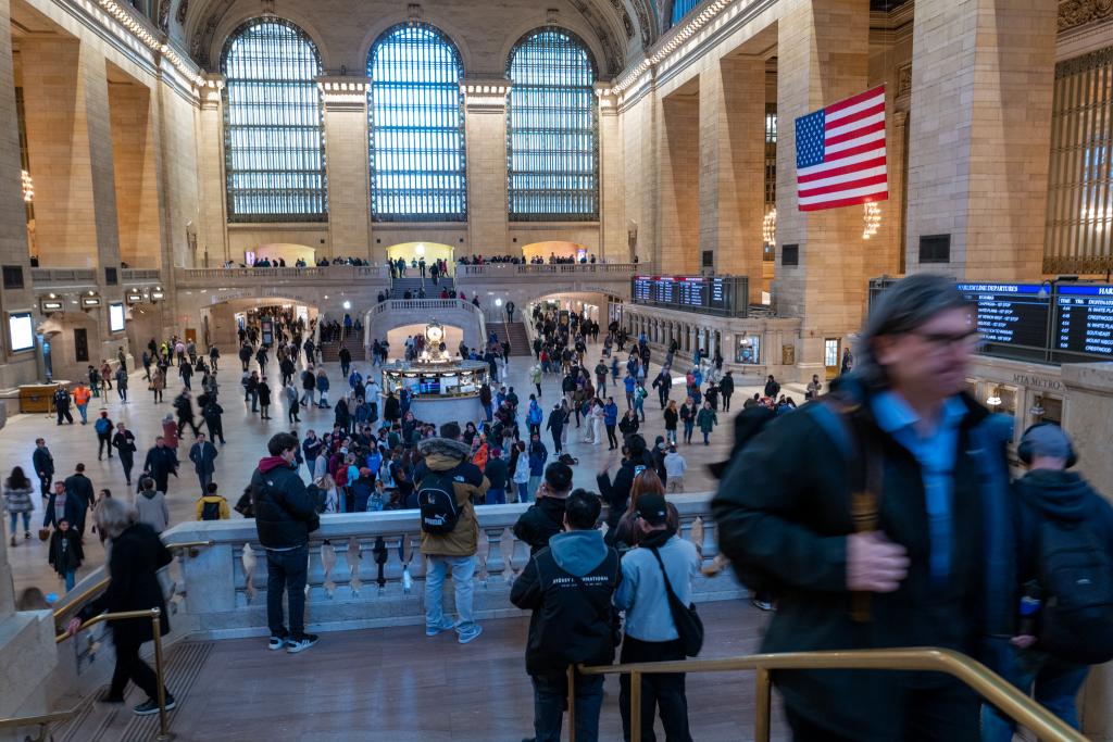 People walk through a busy Grand Central Terminal in Manhattan on March 30, 2023 in New York City