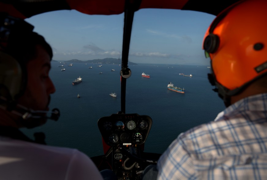 In an aerial view, ships sit anchored in the Panama Bay near the Panama Canal on Sept. 20, 2023 in Panama City, Panama. The Panama Canal Authority restricted the number of vessels that pass through the Panama Canal locks as a drought caused water levels at Gatun Lake to drop. 