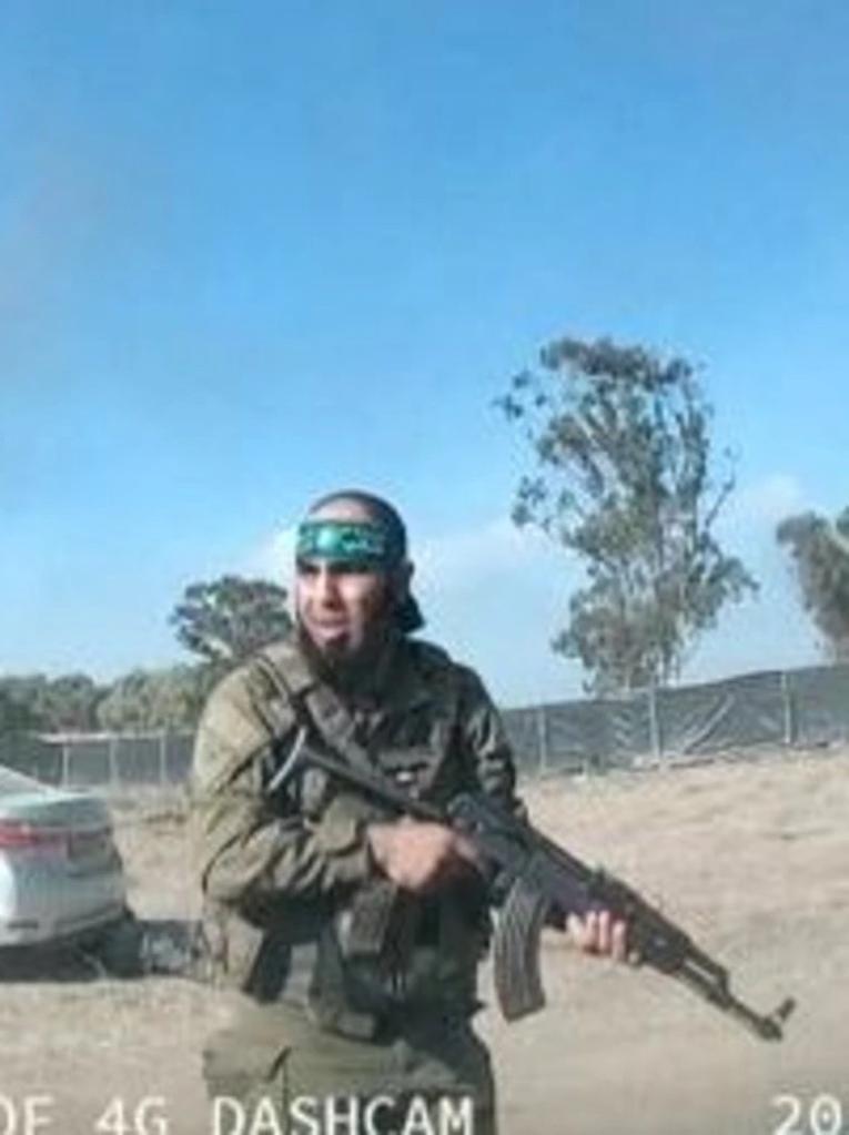 Though Jackson and Mitts could not confirm the identity of the person or entity behind the transactions, they concluded that evidence points to a Hamas affiliation of some kind. (Pictured: a Hamas terrorist at the Tribe of Nova music festival on Oct. 7.)