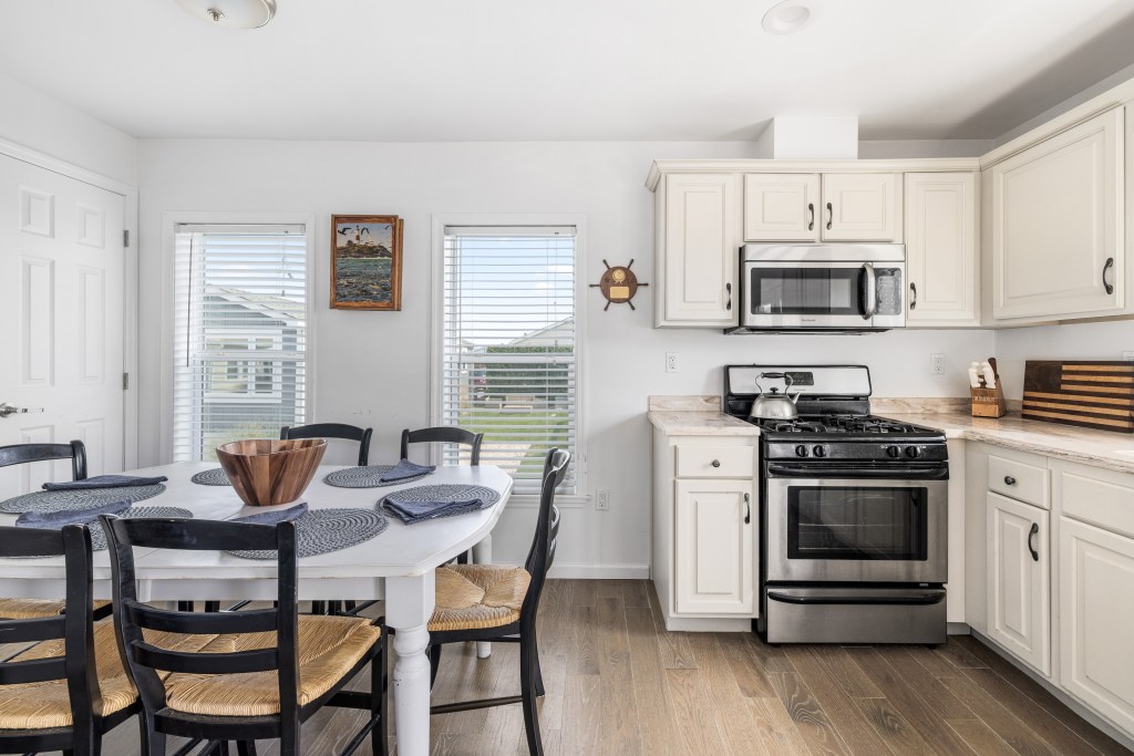 The living area opens to a kitchen.