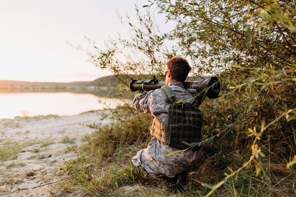 Stock image of man with rocket launcher 