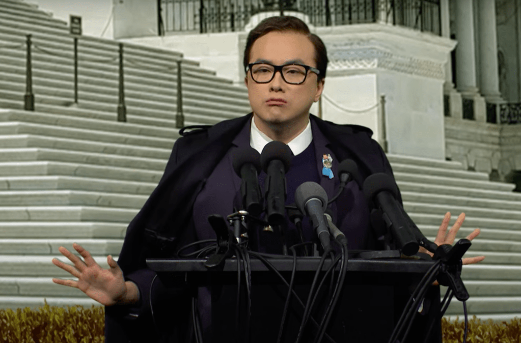 Holding a press conference outside of the Capitol building following his expulsion, Santos, played by Yang, insisted he was being assaulted and bullied by the entire country because he was a "proud, gay thief."