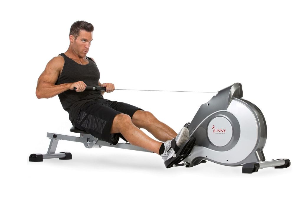 A man on a rowing machine