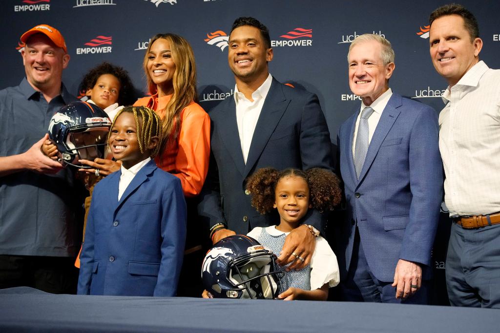 Russell Wilson, here with wife Ciara and their family in March 2022, when he was introduced by the Broncos.