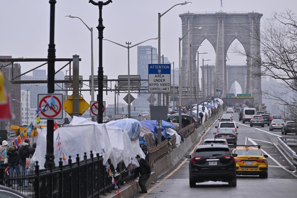 Vendors line up on the Brooklyn Bridge.