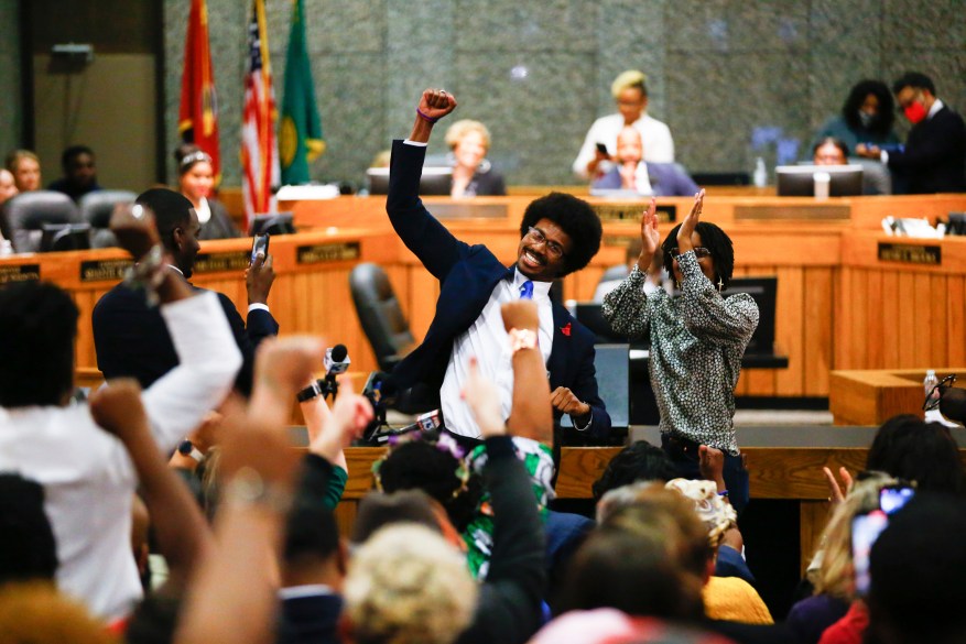 Justin Pearson celebrates with supporters after being reinstated to the the Tennessee House of Representatives by the Shelby County Board of Commissioners building in Memphis, Tenn., on Wednesday, April 12, 2023. Republicans expelled Pearson and Rep. Justin Jones over their role in a gun control protest on the House floor after a Nashville school shooting that left three children and three adults dead.