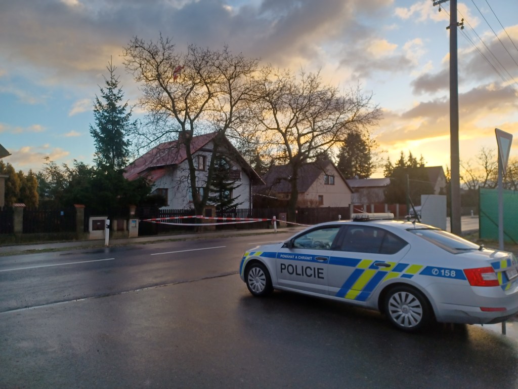 A police car stands in front of a house where the father of a 24-year-old student who later shot dead 14 people and wounded 25 others at the Faculty of Arts at Charles University in Prague was found dead the previous day, in Hostoun, Kladno region, Czech Republic, on December 22, 2023. 