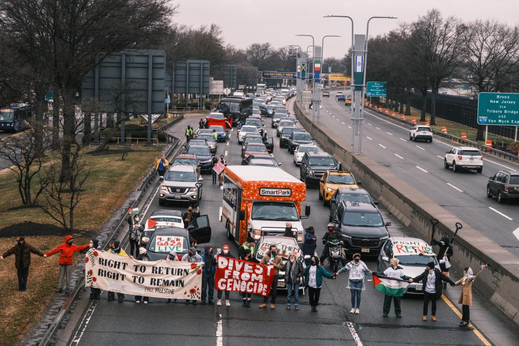 Around 40 pro-Palestinian protestors were arrested after they blocked traffic on the Van Wyck Expressway near JFK Airport in Queens, NY on Dec. 27, 2023.