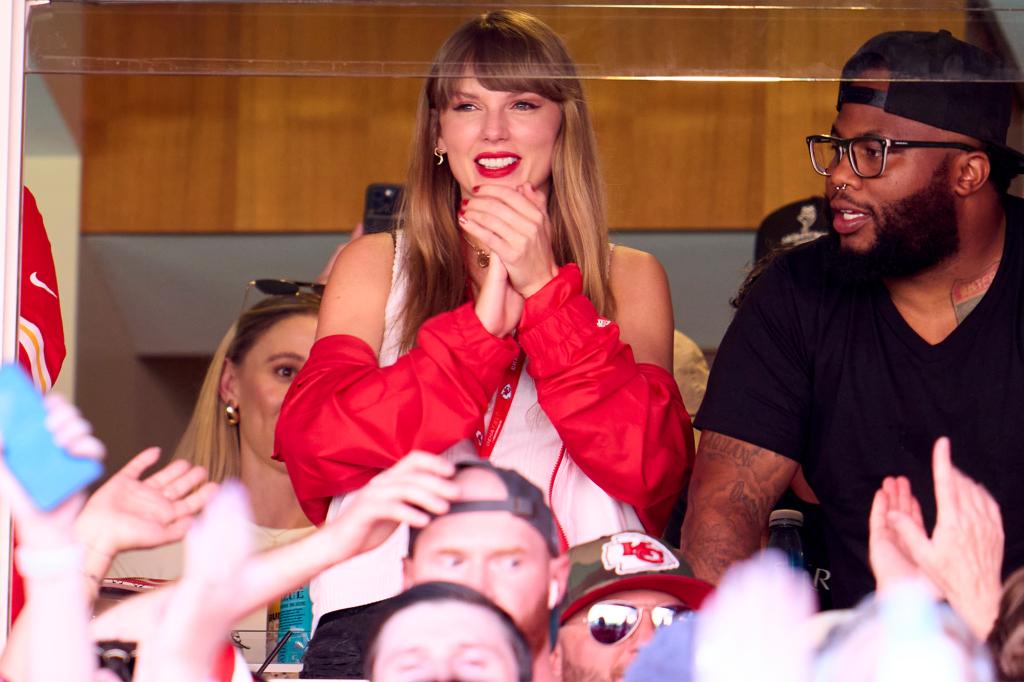 Taylor Swift cheers on boyfriend Travis Kelce during a Chiefs game on Sept. 24, 2023.