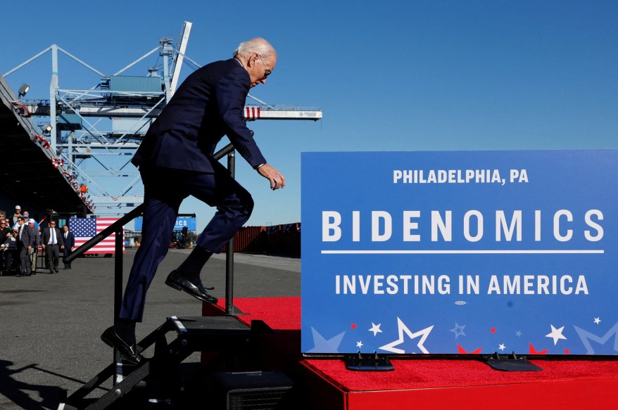 Joe Biden stumbles up stairs to deliver remarks on his economic objectives at the Tioga Marine Terminal in Philadelphia, Pa., on Oct. 13, 2023. 