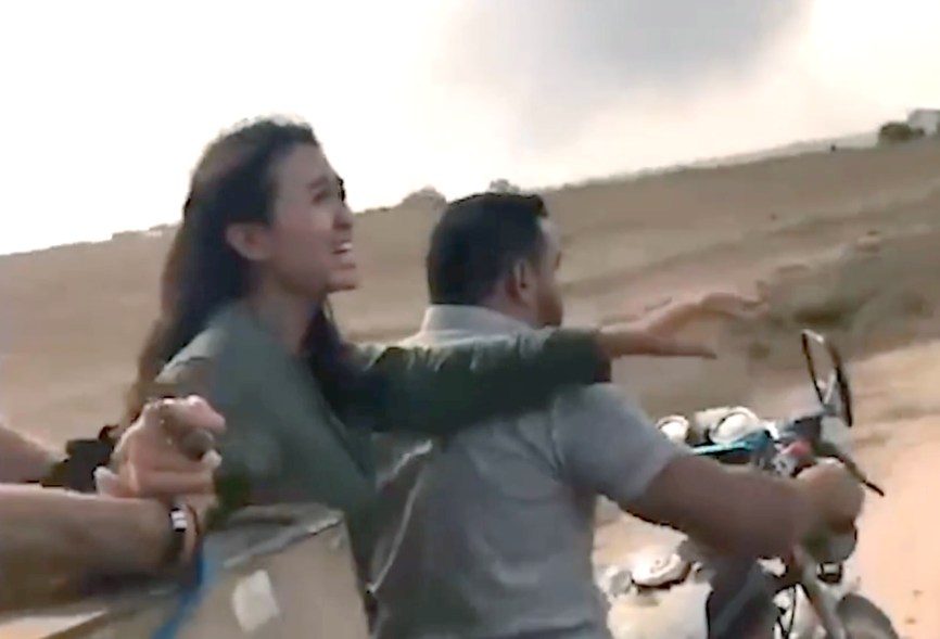 A video still shows Israeli woman Noa Argamani, as she was kidnapped by Hamas terrorists on a motorcycle during an incursion into southern Israel, Saturday Oct. 7, 2023.