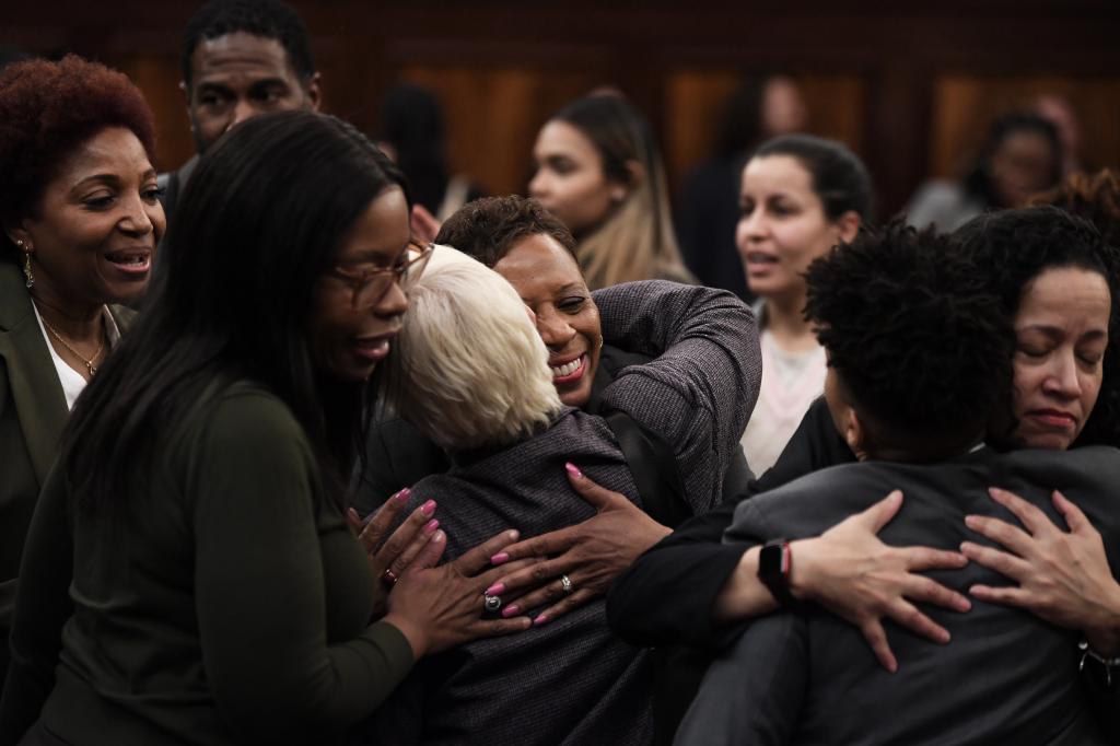 Councilmembers celebrating after overriding the veto.