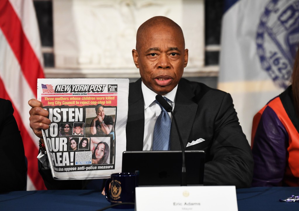 Mayor Eric Adams holding New York Post cover in City Hall press conference on proposed NYPD "How Many Stops Act", photo by Matthew McDermott.