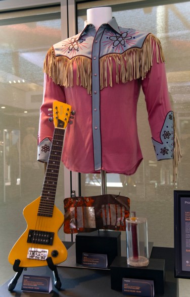 Marty McFly's (Michael J. Fox) Western shirt from "Back to the Future: Part III' (1990); plutonium cell and canister from "Back to the Future" (1985); SFX Spinning Train-Wrecked 2015 DeLorean license plate from "Back to the Future Part III" and Marty McFly's Erlewine Hondo Chiquita guitar from "Back to the Future"