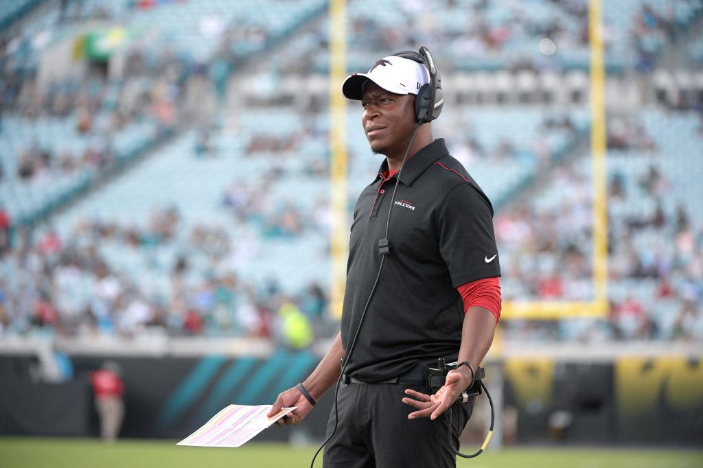 Atlanta Falcons then-assistant head coach/passing game coordinator Raheem Morris watches from the sideline