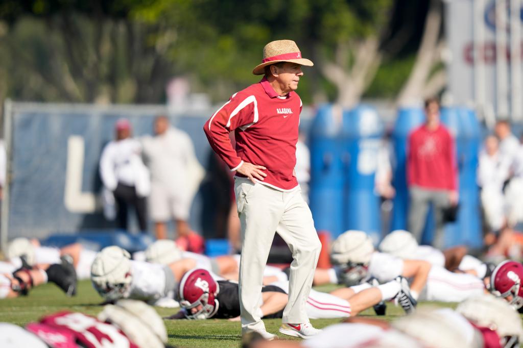 Alabama head coach Nick Saban attends practice