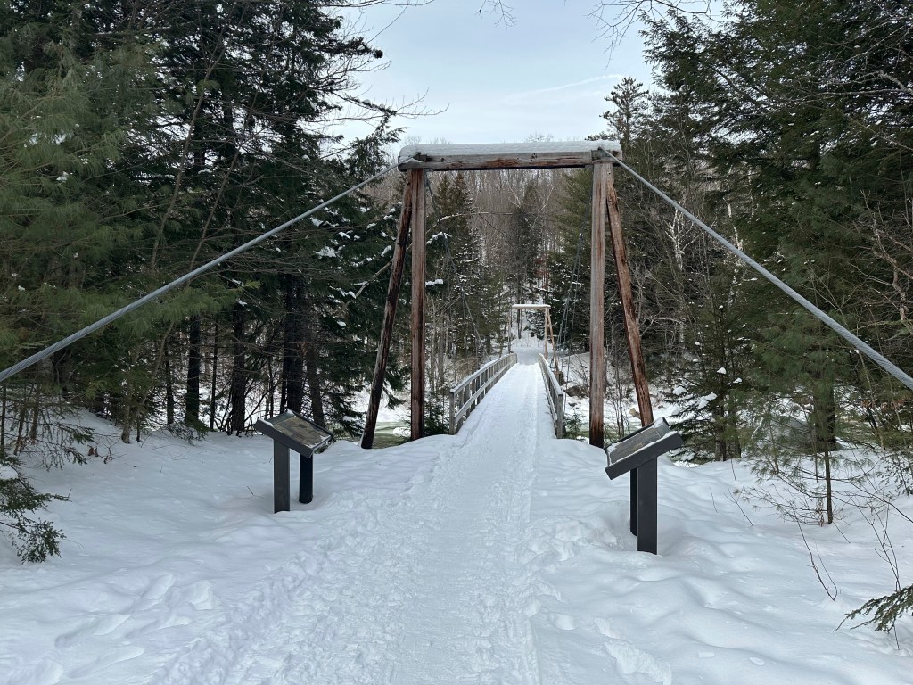 A trailhead in the White Mountains in New Hampshire is covered in snow, near where a hiker died in brutal, single-digit temperatures this week. 