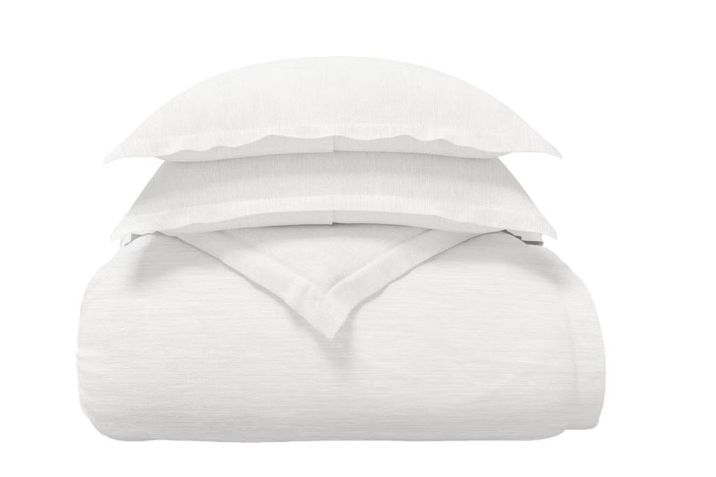 A stack of white bedding.