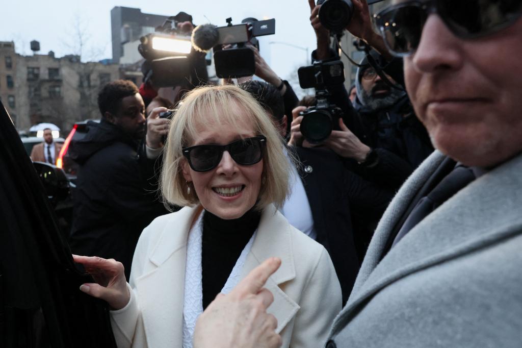 E. Jean Carroll enters a car as she leaves the Manhattan Federal Court in New York City.