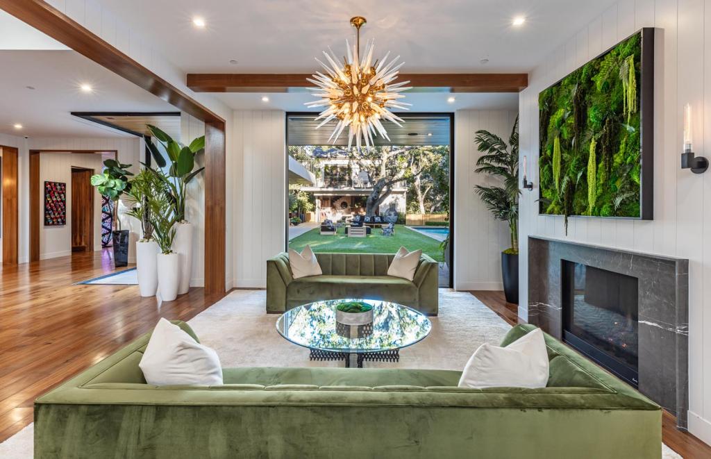 A chandeliered room inside the home. 