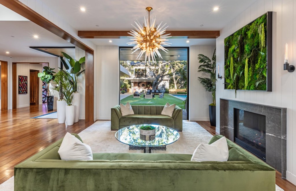 A chandeliered room inside the home. 