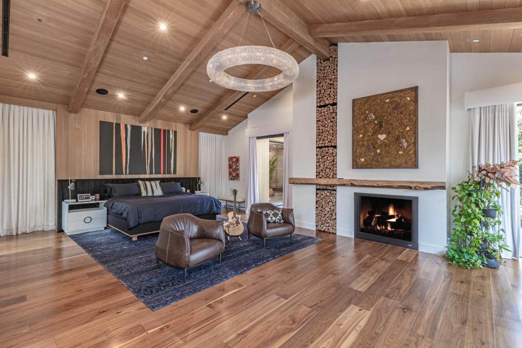 Interior of a room with a handsome fireplace. 