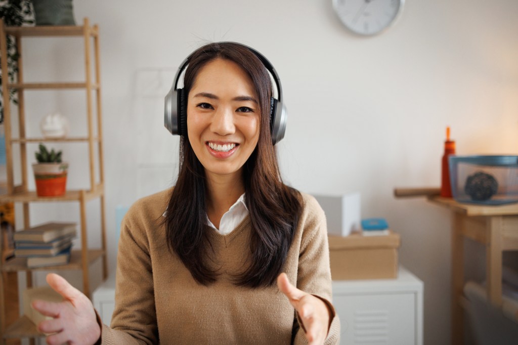 Portrait of young beautiful businesswoman having a video call