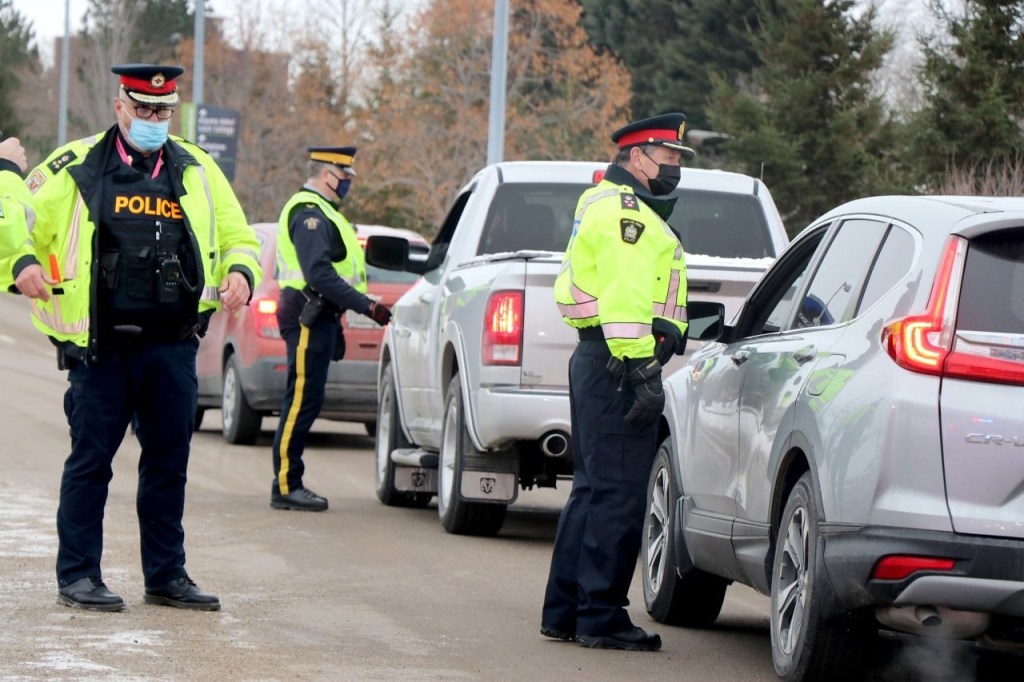 police checking vehicles 