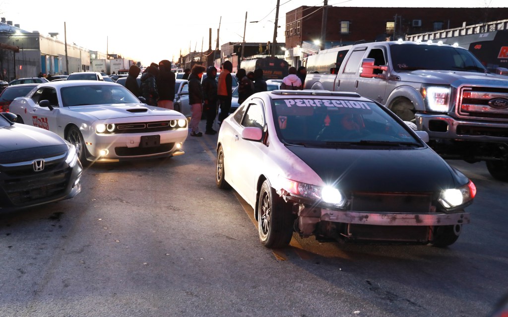 A large police presence checking the vehicles and documents of drivers
at a rally, gathering of possible supporters, friends of the victim that died while doing donuts this morning in the Bronx, at Viele Av and Bryant Av.