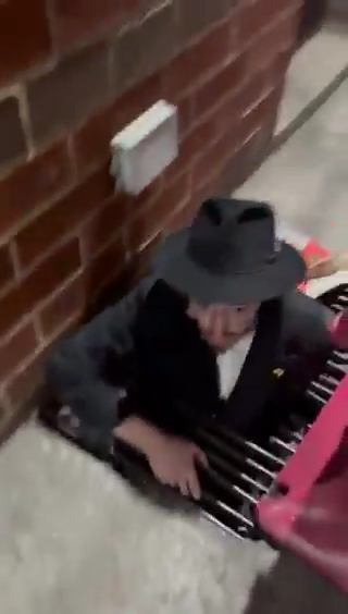 A young Orthodox Jewish man is seen coming out of the tunnel.