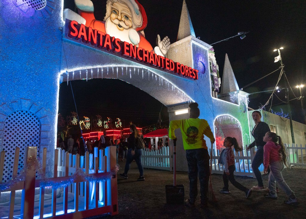 Santa's Enchanted Forest entrance, bright Christmas lights