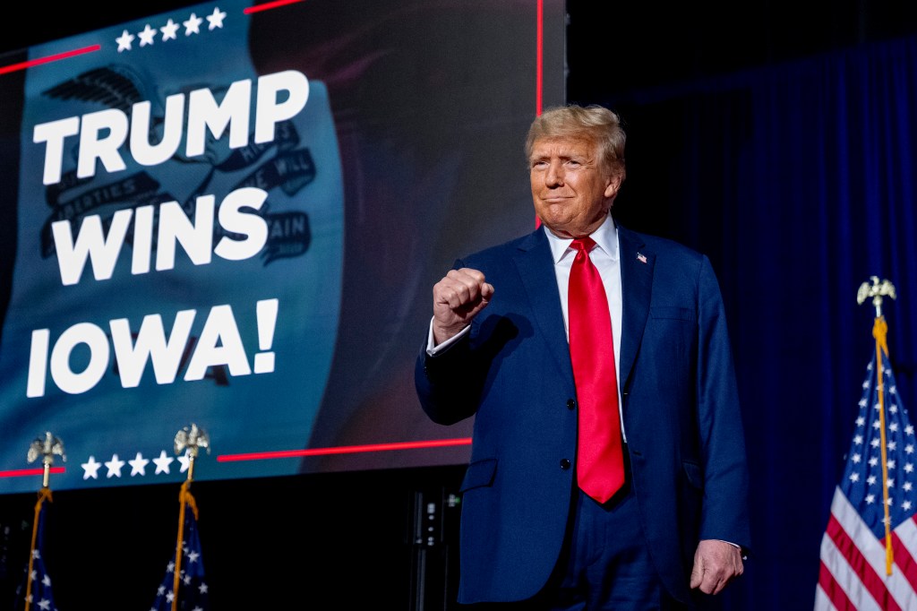 Republican presidential candidate former President Donald Trump takes the stage at a caucus night party in Des Moines, Iowa, Monday, Jan. 15, 2024.