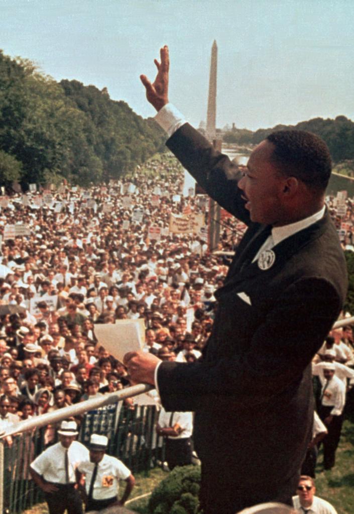 The Rev. Martin Luther King Jr. acknowledges the crowd at the Lincoln Memorial for his "I Have a Dream" speech during the March on Washington, D.C.,  on Aug. 28, 1963.