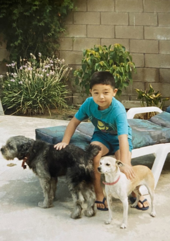 A young Rob Henderson with dogs