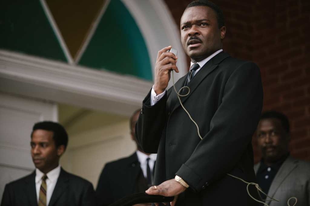 David Oyelowo holding a mic in "Selma." 